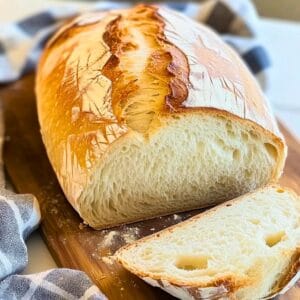 easy beer bread recipe sliced on a cutting board