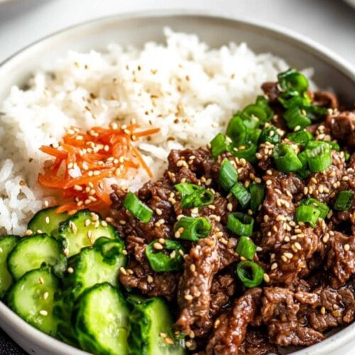 korean rice bowl with cucumber white rice and chives